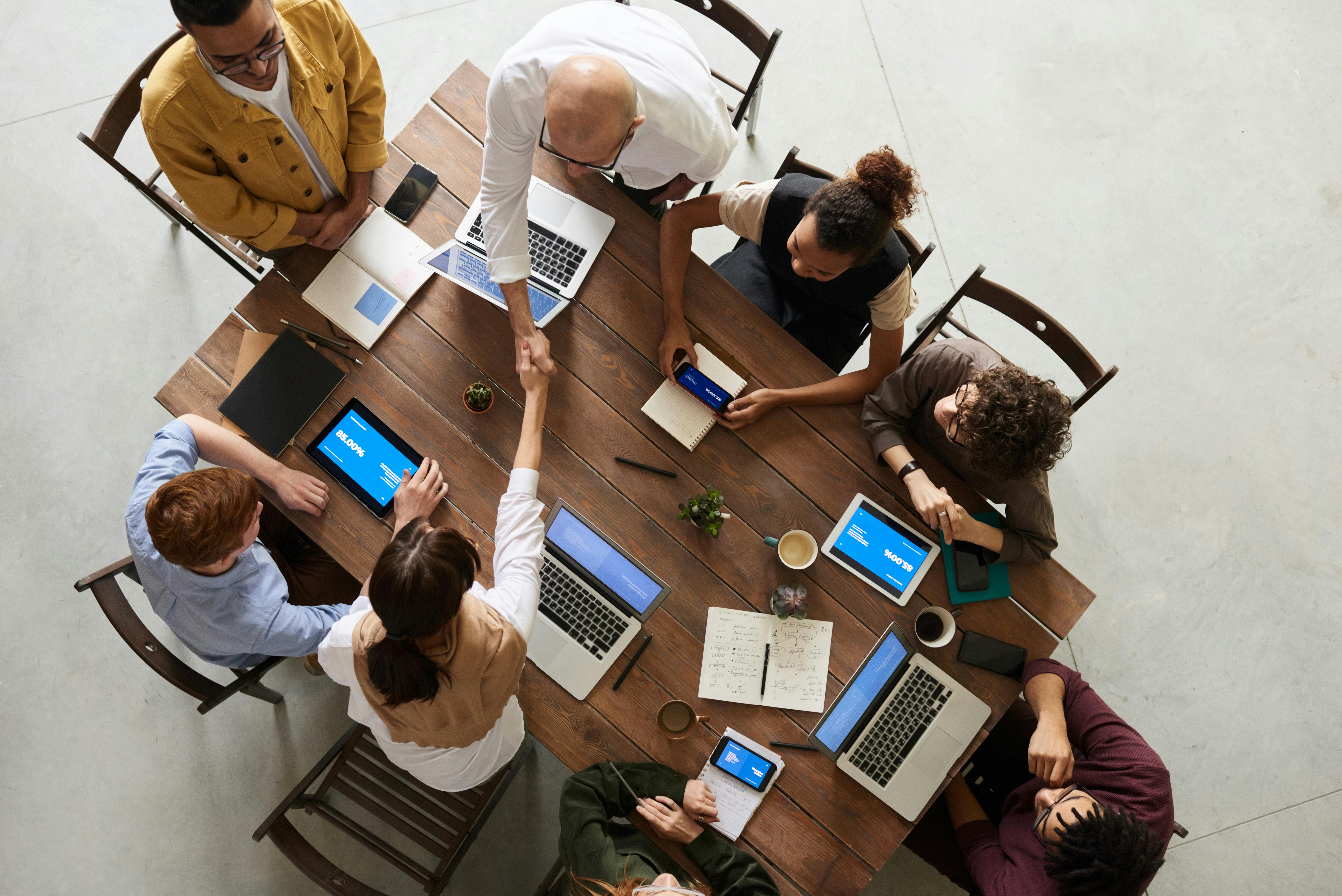 Business professionals analyzing operational data together